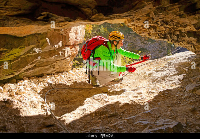 climber-in-a-rock-window-via-ferrata-in-